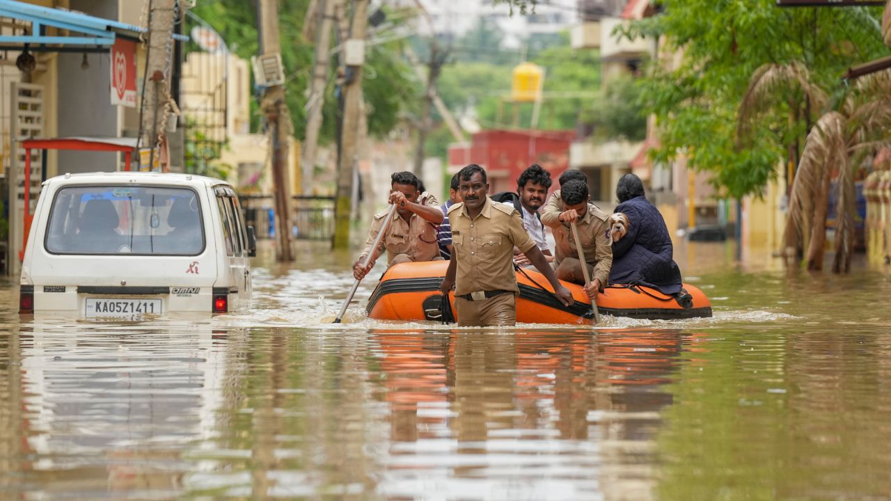 police team rescuing people