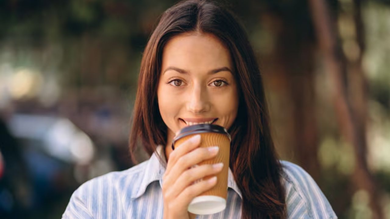 woman sipping coffee
