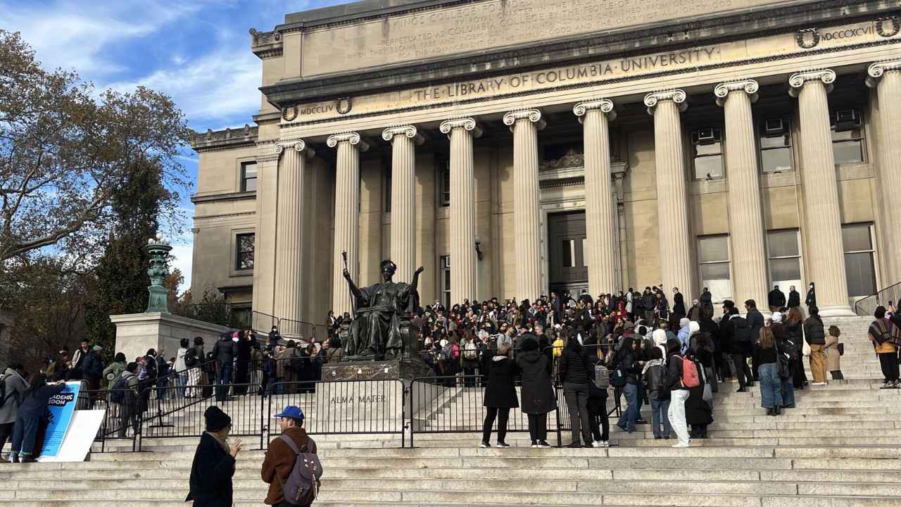 Students at the gate of university । Photo Credit: X/@itslaylas