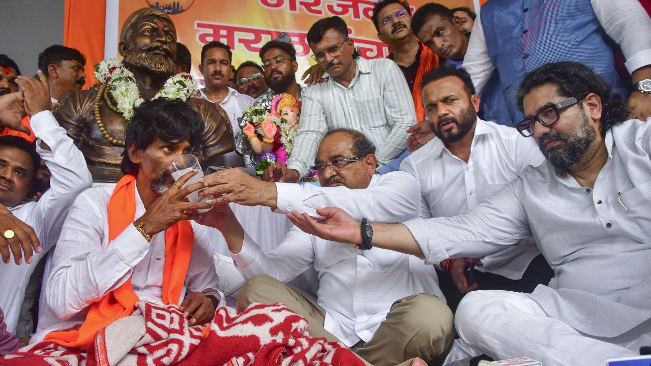 Jarnage patil having juice । Photo Credit: PTI