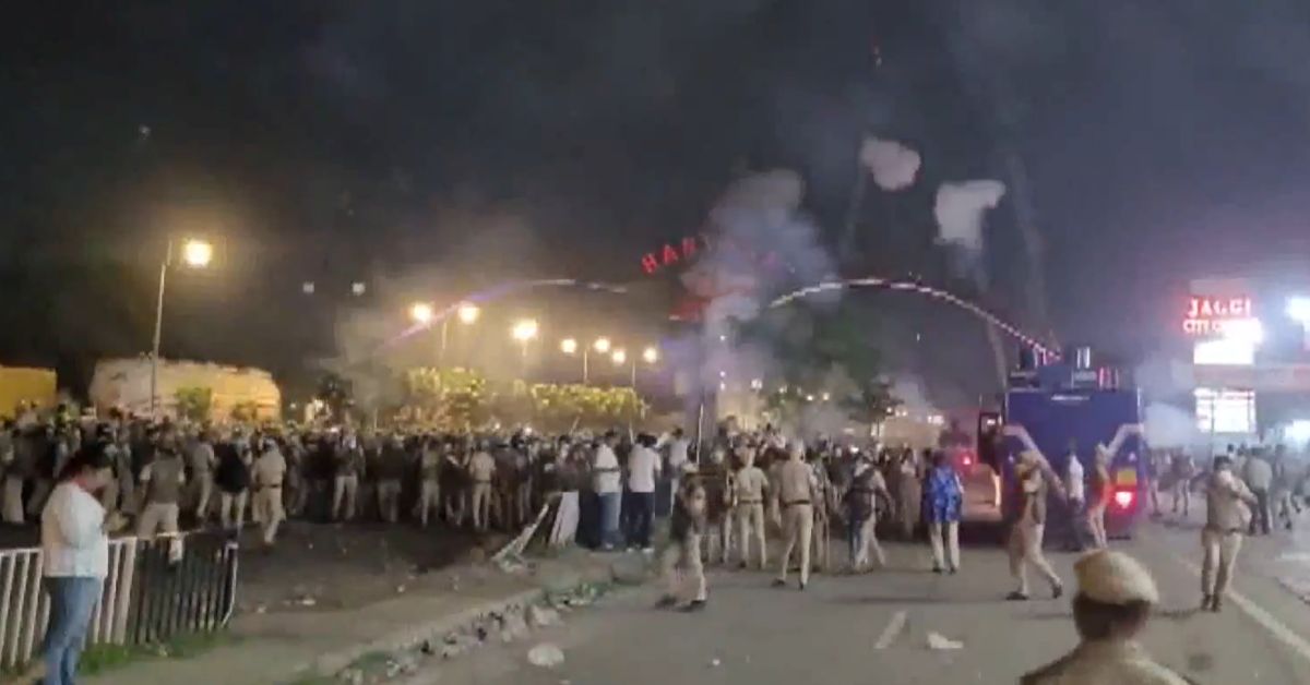 Police deploy force to disperse the members of the Sikh community