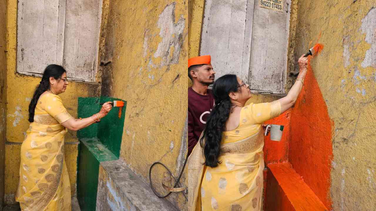 Bjp MP Medha kulkarni painted wall in orange 