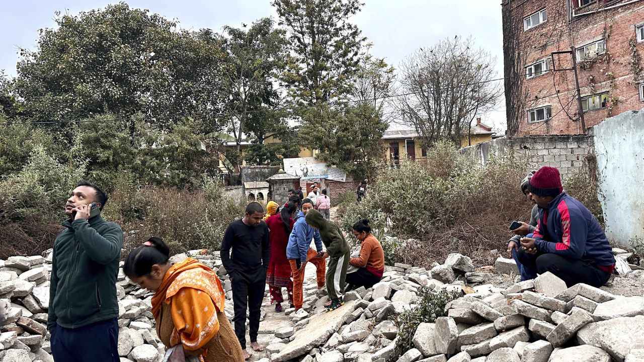 people outside after distraction in nepal earthquae : Photo Credit: PTI