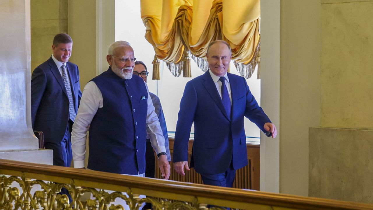 Narendra Modi and Vladimir Putin । Photo Credit: PTI