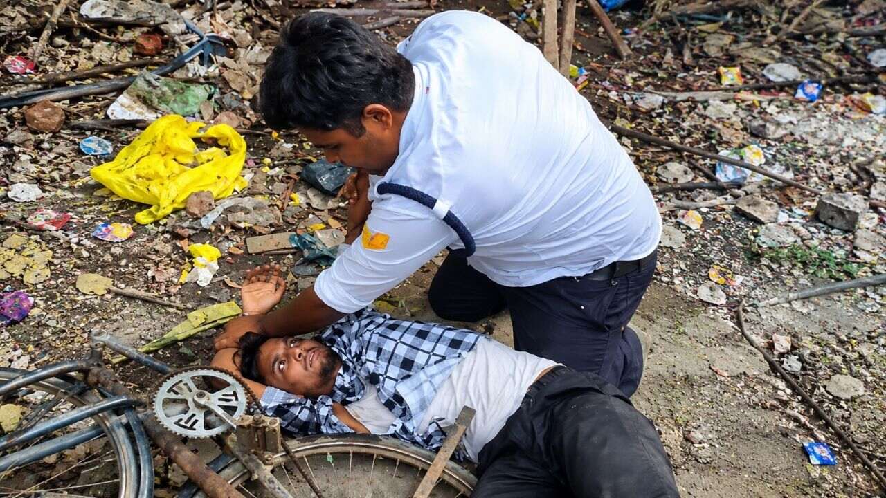 image of traffic police and bike rider fight