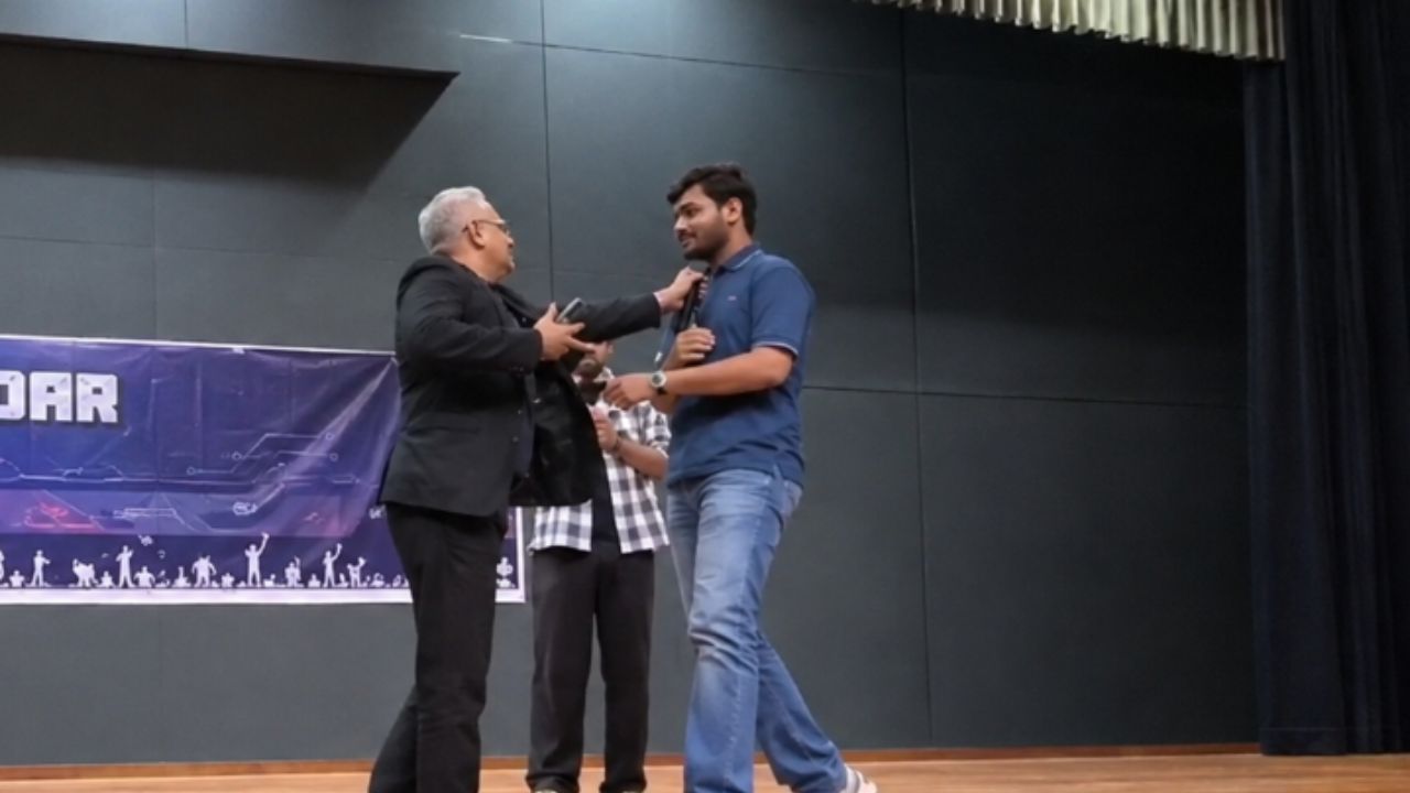 professor grabs student collar