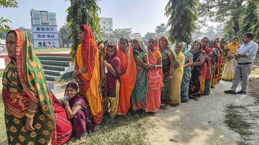 Women in queue for voting। Photo Credit: PTI