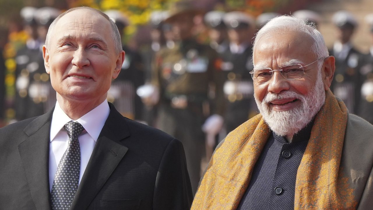 Vladimir Putin and Narendra Modi PTI